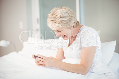 Senior woman using phone