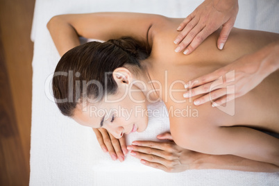 Beautiful woman receiving back massage