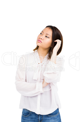 Worried young woman looking away