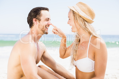 Young couple having fun on the beach