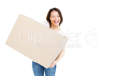 Young woman holding a cardboard box