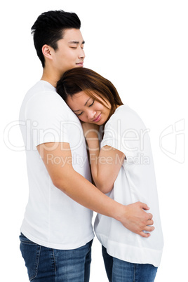 Young couple hugging each other