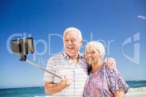 Senior couple taking selfie