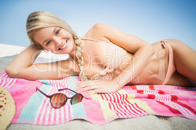 Pretty woman lying on the beach