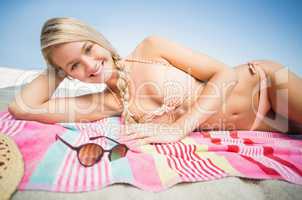 Pretty woman lying on the beach