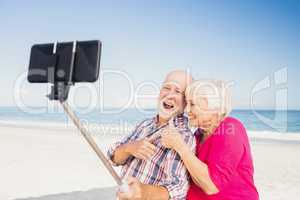 Senior couple taking selfie