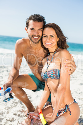 Couple posing at the beach