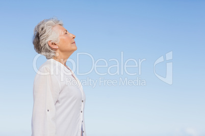 Senior woman relaxing on the beach