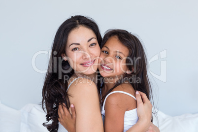 Woman relaxing with her daughter