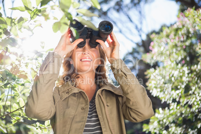 Woman using binoculars