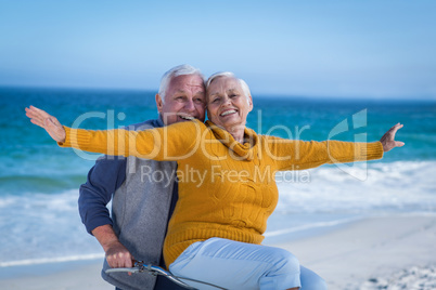 Senior couple with a bike