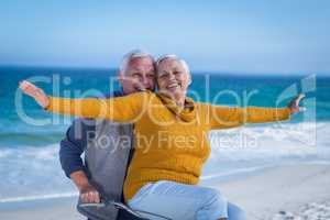 Senior couple with a bike