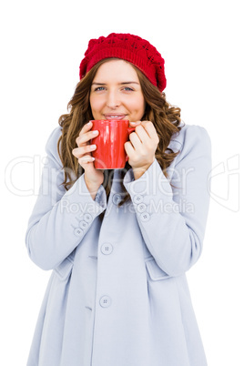 Young woman having cup of coffee