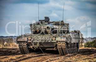 german main battle tank stands in position to shoot