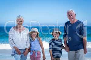 Cute children holding grandparents hands