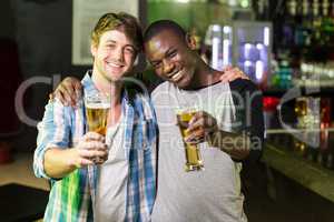 Happy friends having a drink