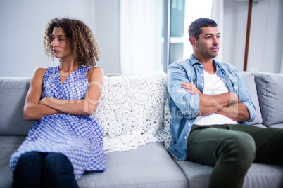 Upset young couple ignoring each other