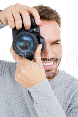 Man photographing with camera