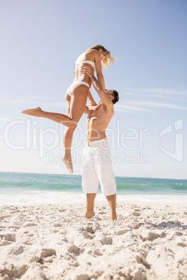 Boyfriend lifting his girlfriend