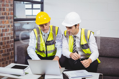 Architects working on laptop