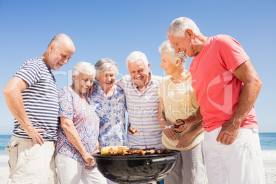 Senior friends having a barbecue