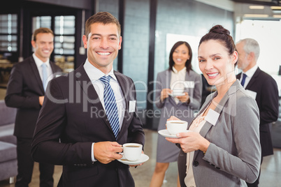 Businesspeople having a discussion during break time