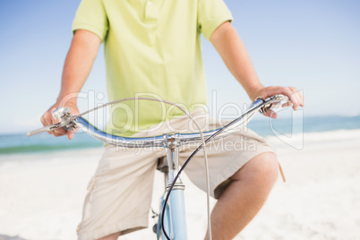 Smiling senior man with bike