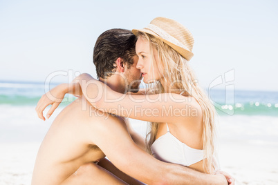 Young couple sitting and embracing each other Young couple sitting and embracing each other