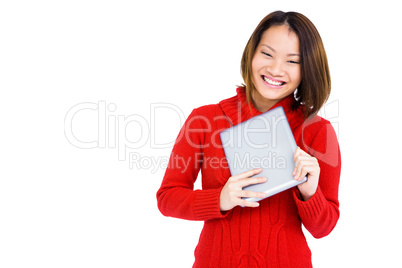 Young woman holding digital tablet