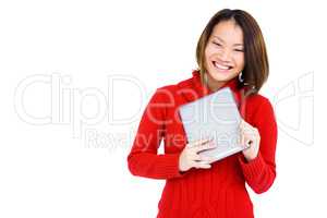 Young woman holding digital tablet