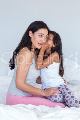 Woman relaxing with her daughter