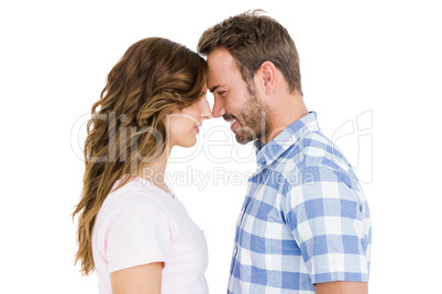 Happy young couple rubbing nose