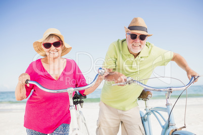 Senior couple going for a bike ride