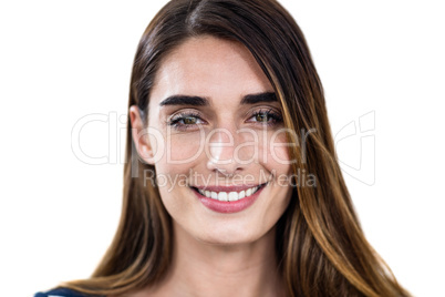 Close-up portrait of smiling young woman