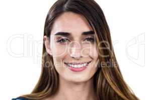 Close-up portrait of smiling young woman