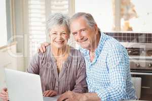 Portrait of happy senior couple with