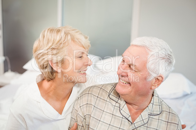 High angle view of happy senior couple in nightwear