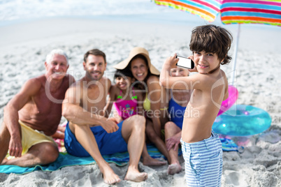 Little taking picture of his family