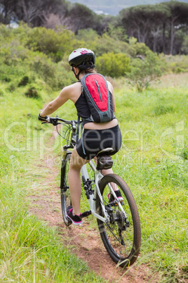 Woman riding her bike