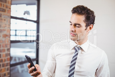 Smart businessman using smartphone