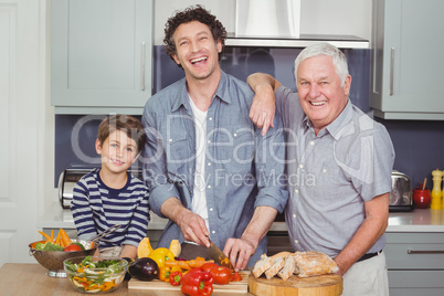 Portrait of smiling family in kitchen