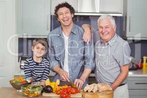 Portrait of smiling family in kitchen