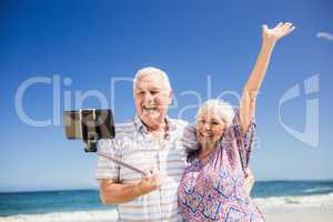 Senior couple taking selfie