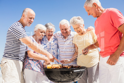 Senior friends having a barbecue