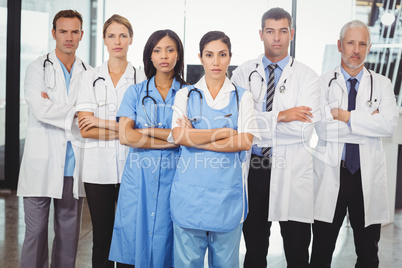 Medical team standing with arms crossed