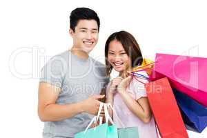 Young couple with shopping bags