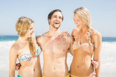 Young friends having fun on the beach