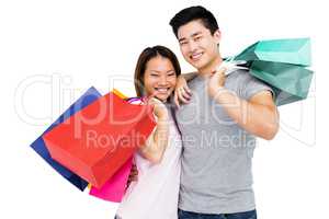 Young couple with shopping bags