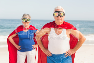 Senior couple wearing superman costume