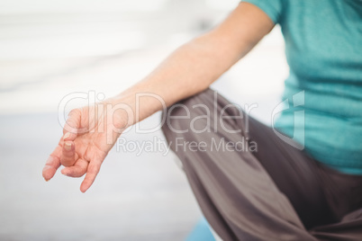 Cropped image of woman doing yoga